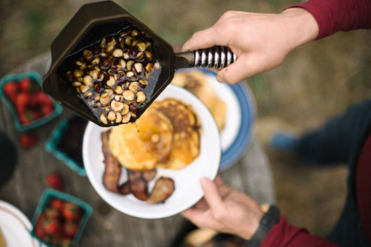 CORNMEAL AND YOGURT PANCAKES WITH HUCKLEBERRIES AND HAZELNUT BROWN BUTTER SYRUP