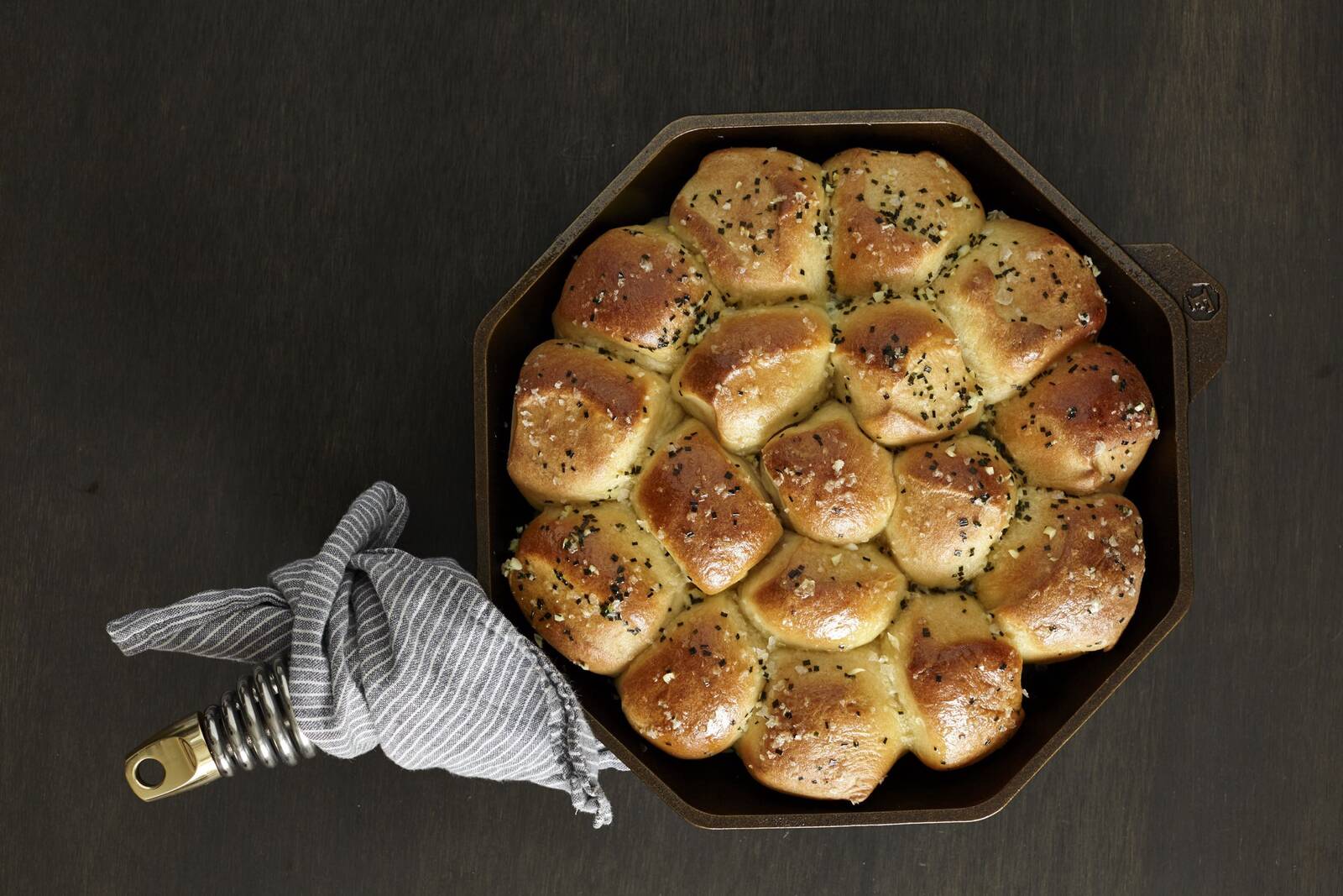 Cooked dinner rolls in Finex skillet