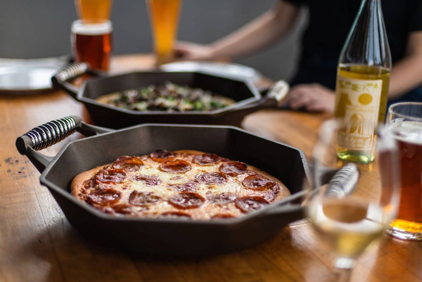 Pizza being cooked in Finex skillet