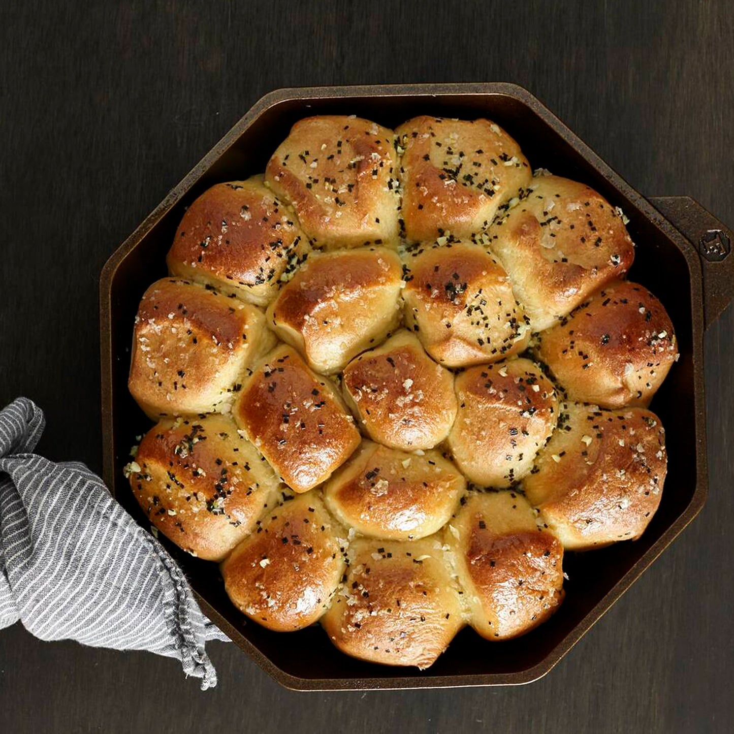 Cooked dinner rolls in Finex skillet