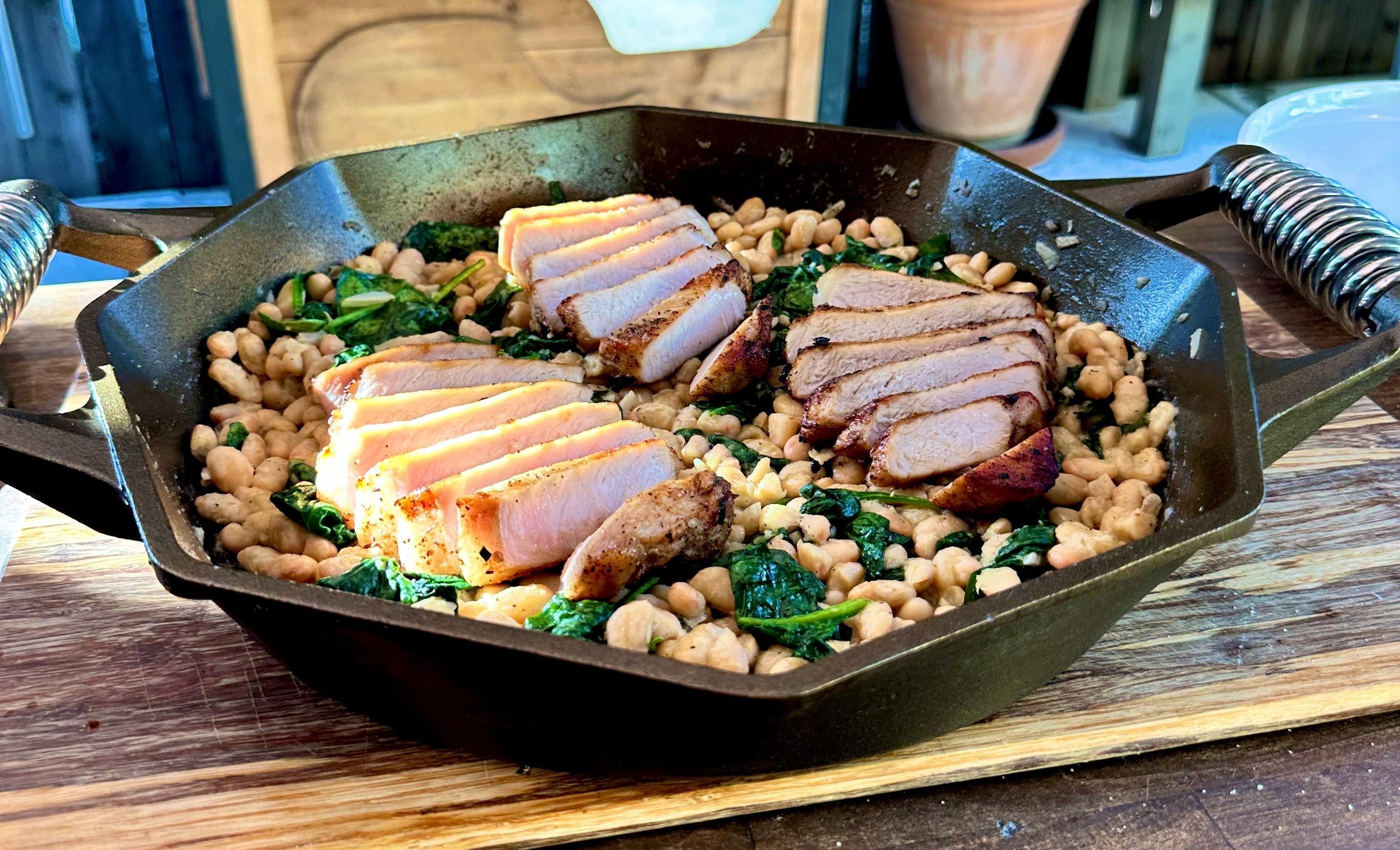 PAN-SEARED PORK CHOPS WITH CANNELLINI BEANS AND SPINACH