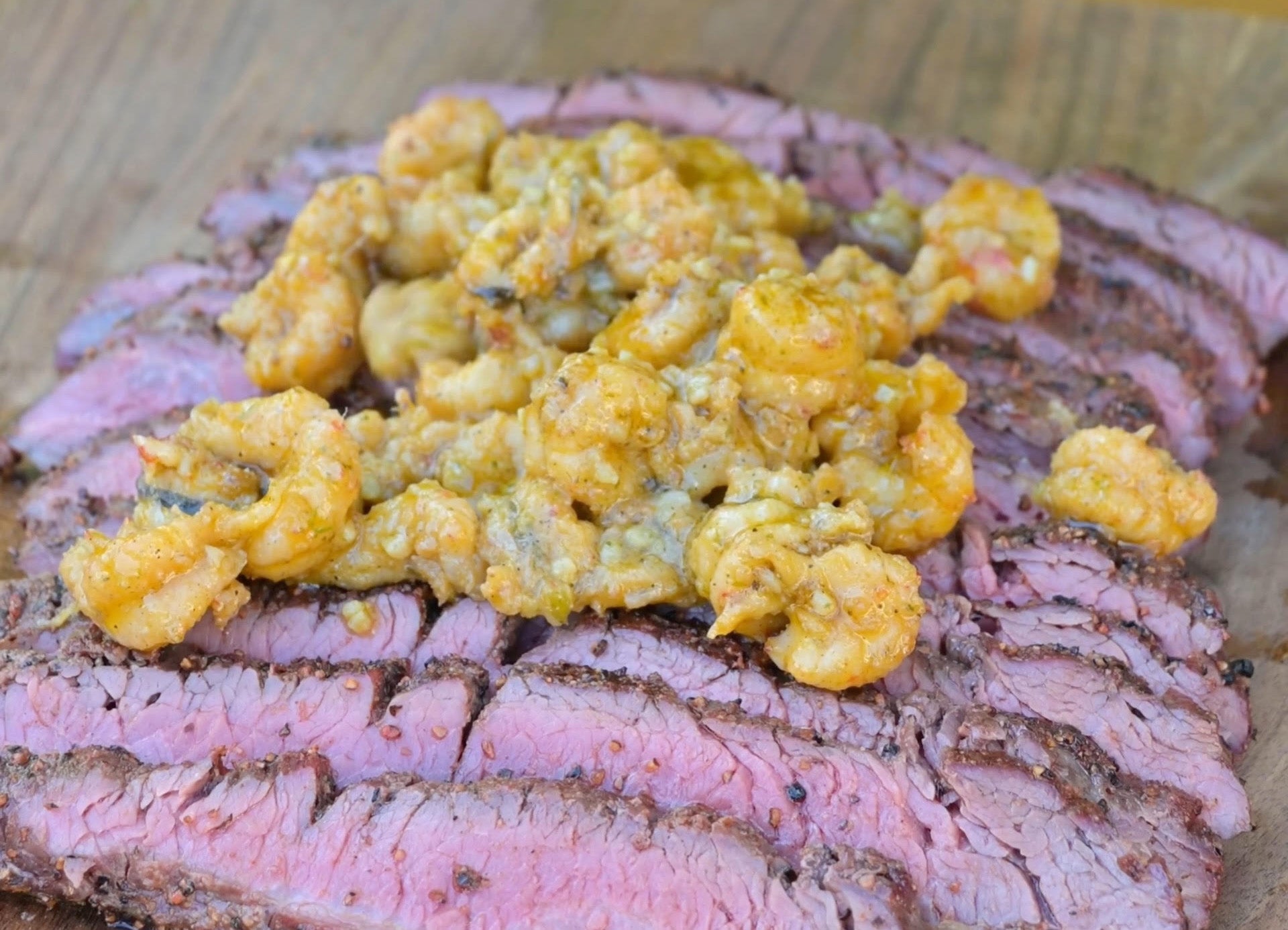 WAGYU FLANK STEAK AND CAJUN DRIP CRAWFISH