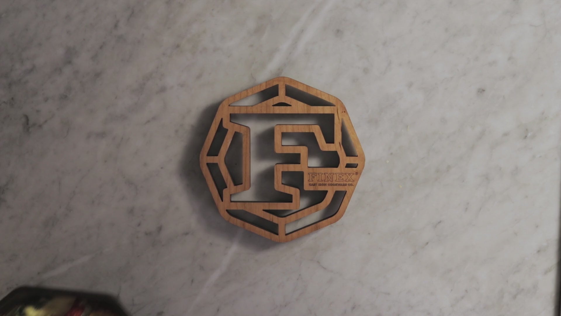 video of a FINEX wooden trivet