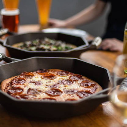 Pizza being cooked in Finex skillet
